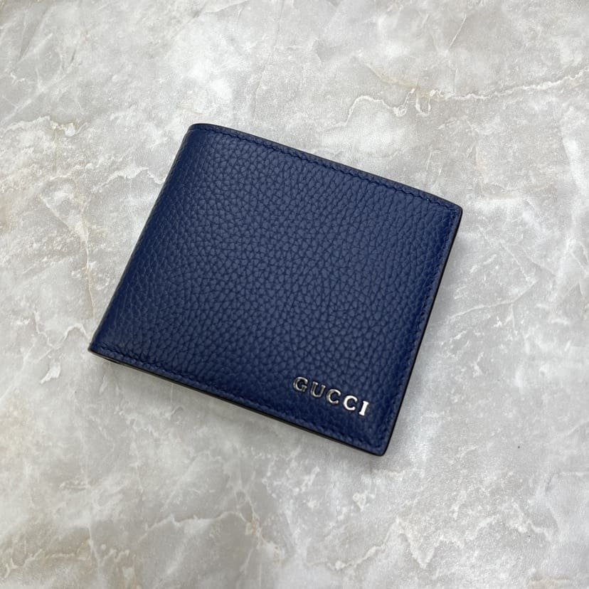 Bi-fold wallet with Gvc*1 script