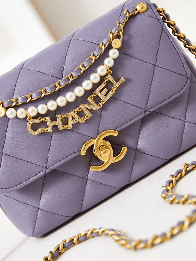 Ch**el  Shiny Lambskin Quilted Mini Pearl Logo Flap Light Purple