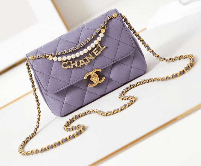 Ch**el  Shiny Lambskin Quilted Mini Pearl Logo Flap Light Purple